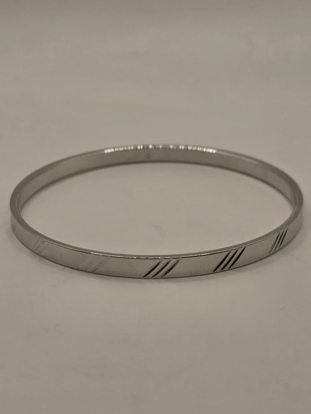 Vintage Monet Silver Tone Bangle Bracelet Textured Diagonal Slash Cut Out Design